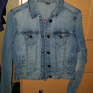 Super cute cropped denim jacket .